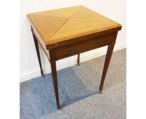 A good Edwardian period mahogany envelope-style card table having cross-banded top with carved moulded edges and single full-