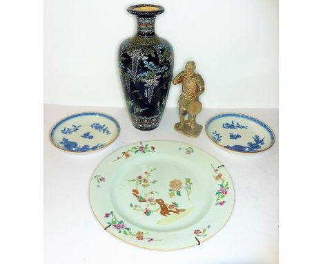 Two 18th century blue-and-white Chinese saucers, together with an 18th century Chinese famille rose porcelain plate, a late 1