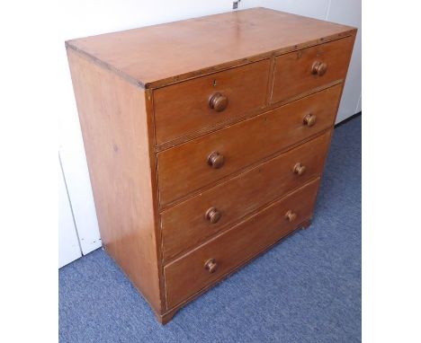 A late 19th century pine caddy-top chest; the exposed dovetails above two half-width and three full-width graduated drawers r