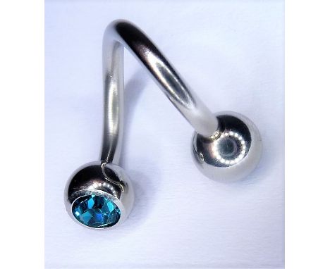 A boxed belly ring&nbsp;(The cost of UK postage via Royal Mail Special Delivery for this lot will be £10 inc. VAT)