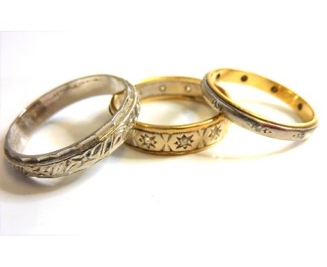 An 18-carat gold eternity ring together with two other eternity rings (3)&nbsp;(The cost of&nbsp;UK postage&nbsp;via Royal Ma