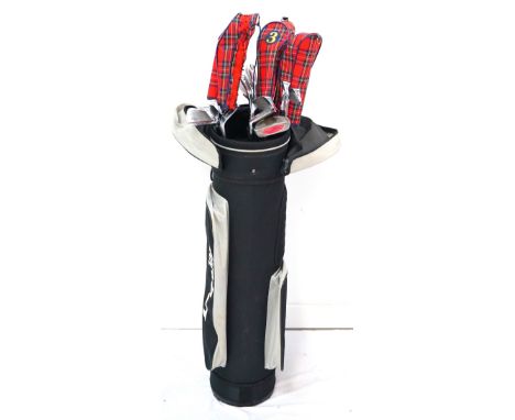 SET OF BEN HOGAN GOLF CLUBS
comprising a 1, 3,and 5 wood, putter, sand iron, equalizer pitching wedge, 2, 3, 4, 5, 6, 7, 8 an