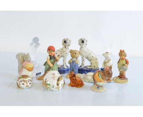 A collection of miscellaneous porcelain figurines, including three Royal Crown Derby animal paperweights, two Beswick Beatrix