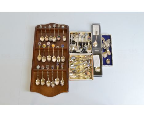 A collection of souvenir spoons, various materials, silver, silver plate, some with enamel decoration, London, Jerusalem, Can