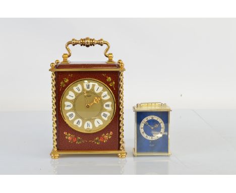 A continental hand painted and brass mantel clock, with circular brass dial and white enamel roman numerals, with mechanical 