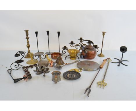 A collection of brass and copper ware, mostly Norwegian in origin including a pestle and mortar, a copper kettle, four sconce