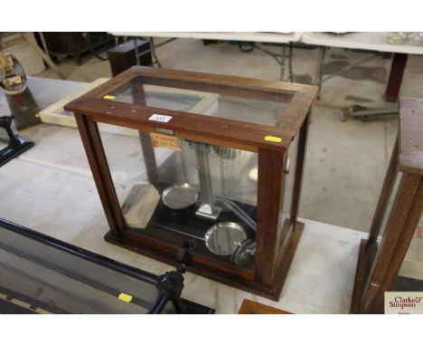 A set of Griffin cased laboratory scales and weights 