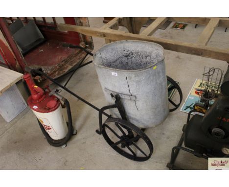 A Vintage water cart with galvanised bucket, metal frame and wheels