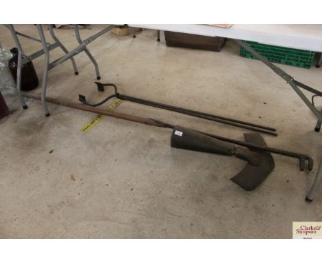 A breast plough shear and two vintage steam engine tools 