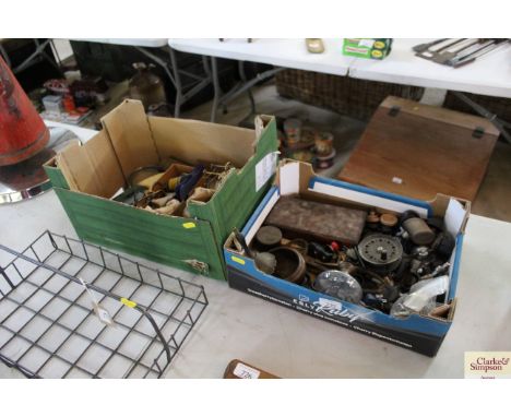 Two boxes containing fishing reel, a small hand bell, wooden box, Hornby boat hull, magnifying glasses, vintage glasses etc.