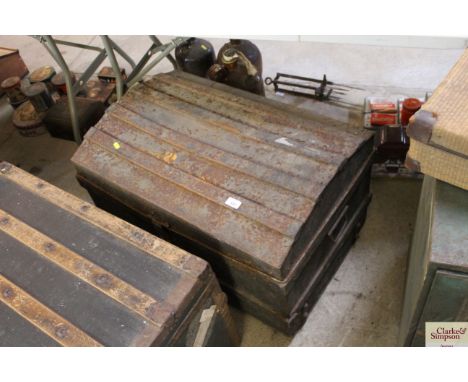 A metal bound travelling trunk 