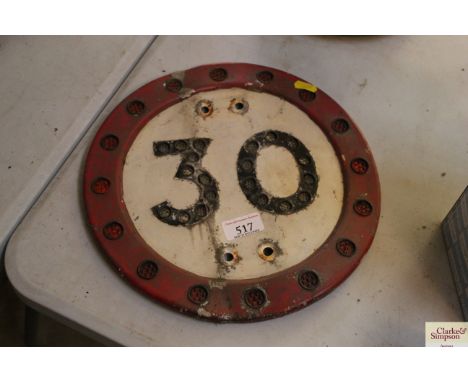 A vintage "30MPH" road sign, approx. 12" dia.