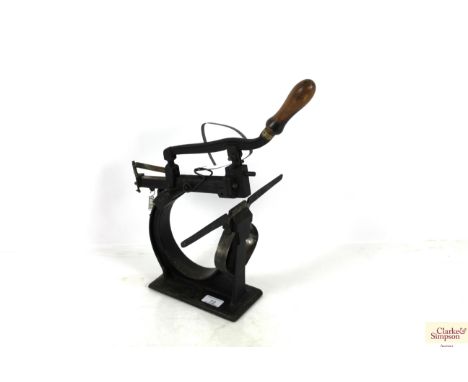 A vintage punch / stapling machine