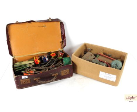 A box of vintage toys and a vintage train set