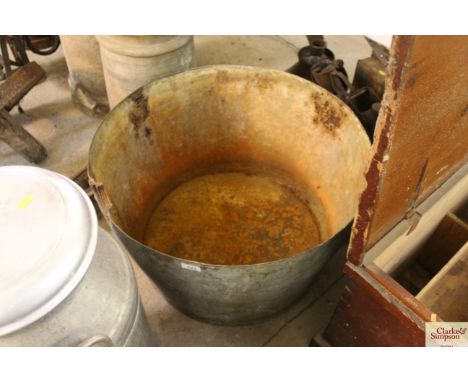 A large circular galvanised trough, approx. 26½" dia.
