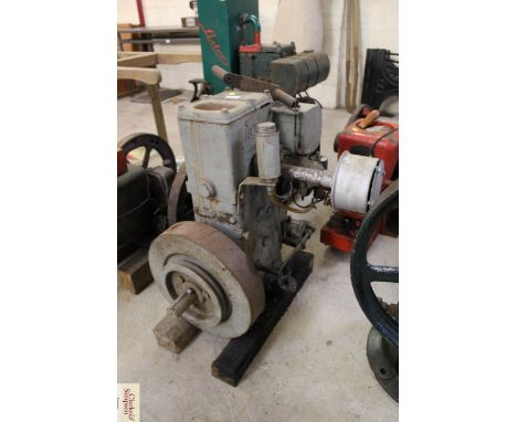 A Lister D dual fuel stationary engine with starting handle