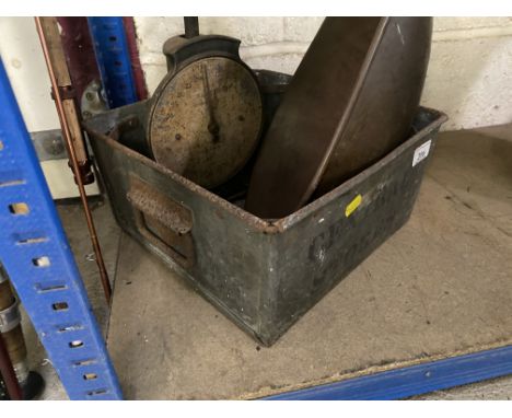 A Central Stores storage bin, scales