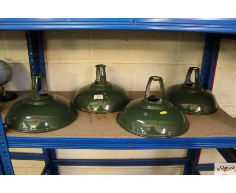 Four green enamel light shades 