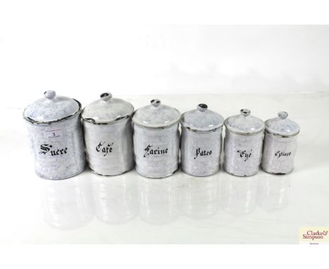 A set of six graduated French enamel storage jars 