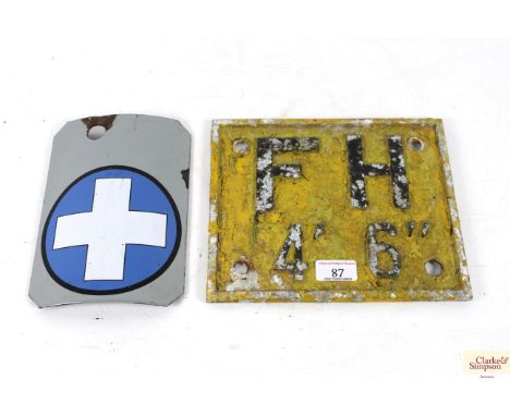 A "Blue Cross" enamel sign and a Fire Hydrant sign 