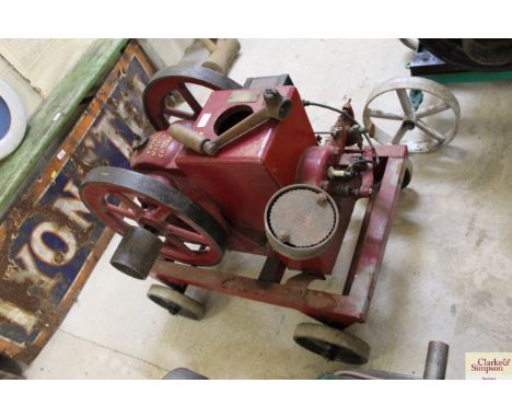 A Bradford Amanco stationary engine on trolley base with handle 