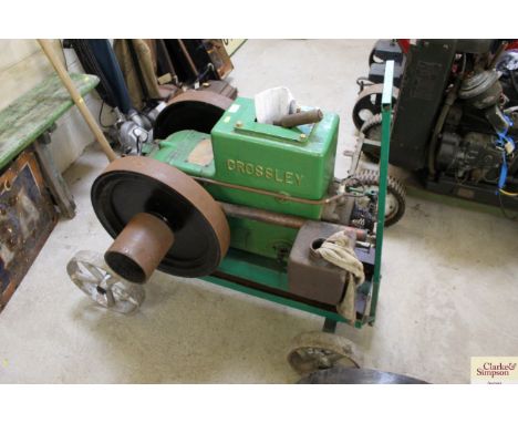 A Crossley PH 1050 stationary engine on trolley base with starting handle and instructions 