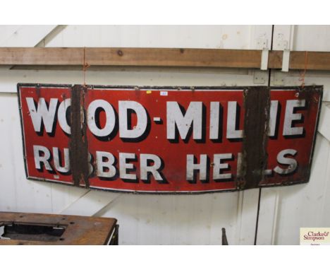 A "Wood-Milne Rubber Heels" enamel advertising sign, approx. 72" x 24"