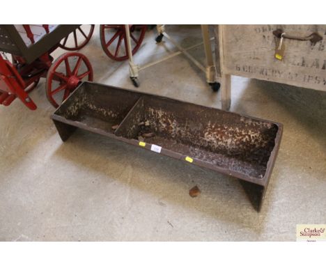 A cast iron trough approx. 38" long 