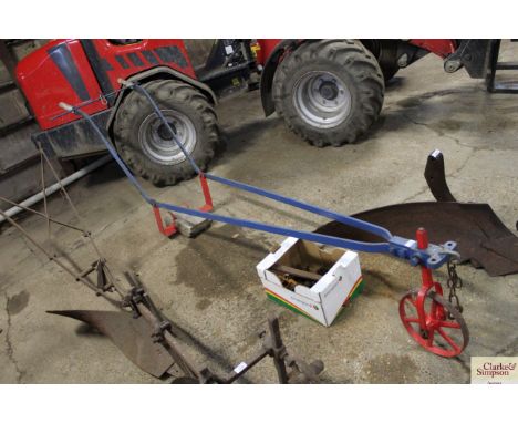 A vintage horse drawn lifter and spares 