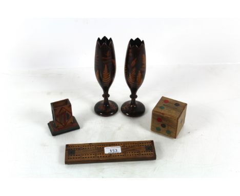 A pair of 19th Century Mauchline "Fern Ware" spill vases, a  cribbage board, dice form money box and a match holder