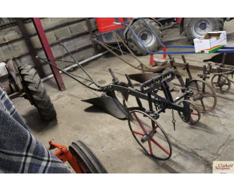A vintage horse drawn plough 