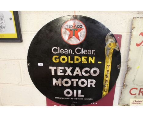 A "Golden Texaco Motor Oil" circular enamel sign, approx. 30" dia. 