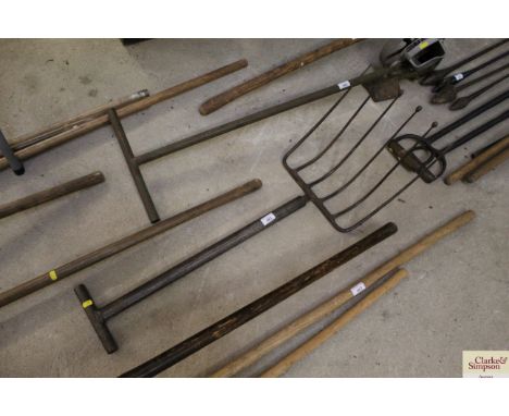 A metal handled potato fork