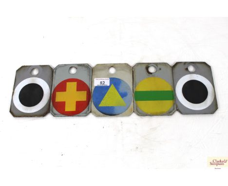 Five small enamel signs
