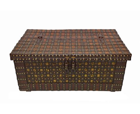 A large 19th century iron bound gilt decorated Indian teak trunk, 130cm wide x 75cm deep.  Illustrated
