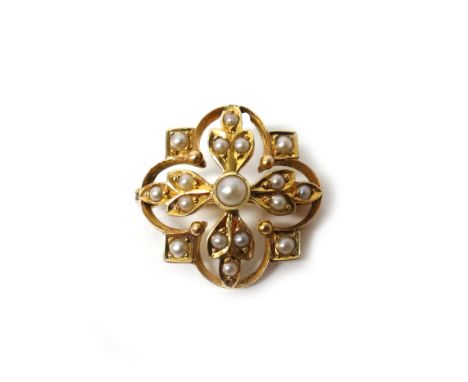 A gold and seed pearl set pendant brooch, in a quatrefoil shaped openwork design, gross weight 3.7 gms.