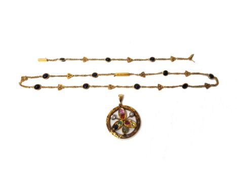 A gold, sapphire, cat's eye, emerald and gem set pendant of circular openwork form, a gold, cabochon sapphire and seed pearl 