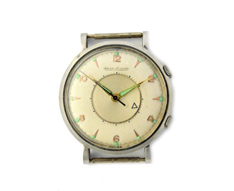 A gentleman's steel circular cased Jaeger-leCoultre Memovox alarm wristwatch, the signed circular silvered dial with an inner