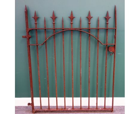 A 19th century wrought iron garden gate with fleur de lys decoration, 124cm wide x 160cm high.