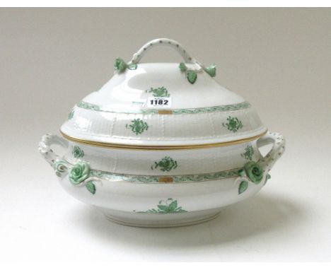 A Herend porcelain part dinner and tea service decorated in the green Chinese bouquet pattern, comprising; an oval two handle