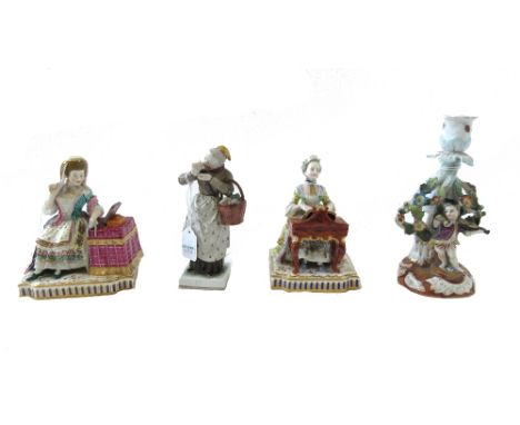 Two Minton porcelain figures from the 'Senses' set, 19th century, with 'Sound' modelled at a piano, 14cm high, and 'Sight' mo