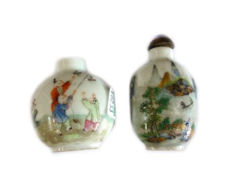 A Chinese porcelain snuff bottle, iron-red Daoguang seal mark, painted in a famille-verte palette, on one side with two figur