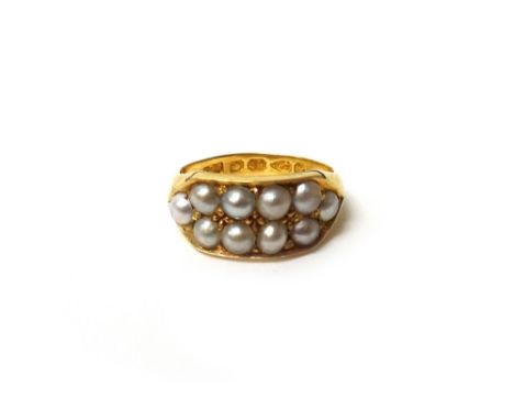 A Victorian 18ct gold and seed pearl set ring, mounted with two rows of seed pearls, Chester 1881, ring size K and a half, wi