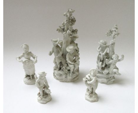 A group of five Derby biscuit porcelain figures and groups, late 18th century, comprising; a pastoral group of four youths an