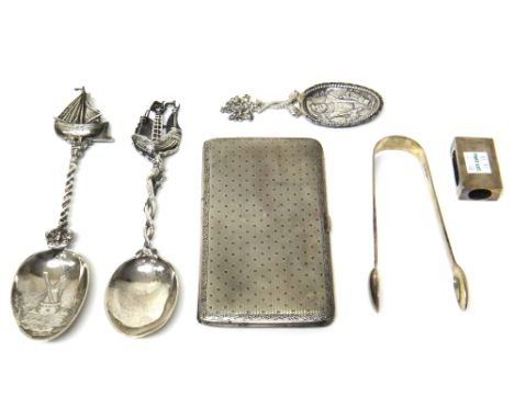 Silver, comprising; a rectangular cigarette case, with engine turned decoration, Birmingham 1918, a pair of sugar tongs, Lond