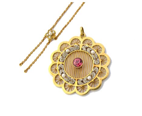 A gold, rose diamond, seed pearl and pink tourmaline set pendant, pierced in a shaped circular design, detailed 15 CT, gross 