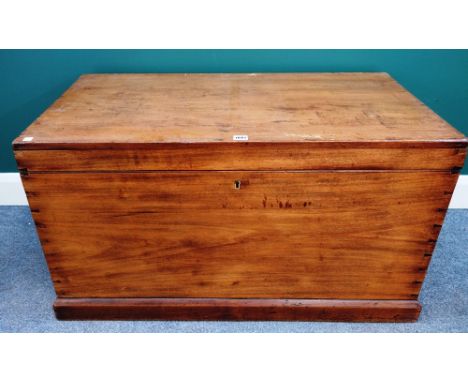 A rectangular hardwood trunk with visible dovetails, on a plinth base, 101cm wide x 51cm deep.
