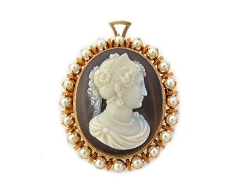 A gold mounted carved banded agate cameo and cultured pearl pendant brooch, carved as the portrait of a lady, within a surrou