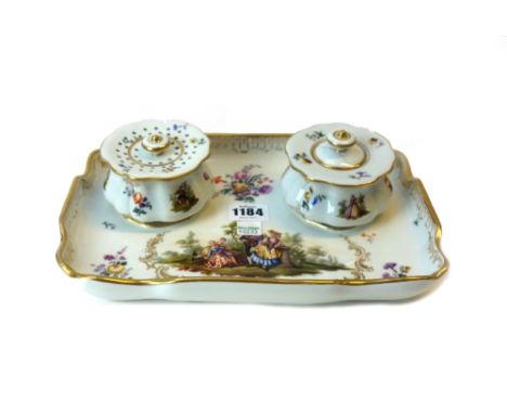 A Meissen porcelain desk set, 20th century, decorated with a gallant and companion, 27cm wide, and a Meissen porcelain part t