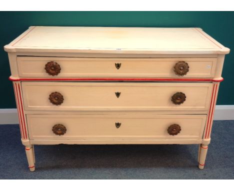 A Louis XVI style cream and red painted three drawer commode, on turned supports, 125cm wide x 61cm deep.